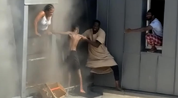Man Climbs 6th Floor Ledge To Rescue Family Trapped In Apartment Fire